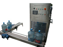 Load image into Gallery viewer, WFC300 with an optional exit conveyor system to return full bottles to the same area as loading empty ones. 