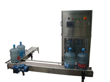 Load image into Gallery viewer, WFC300 with an optional exit conveyor system to return full bottles to the same area as loading empty ones. 
