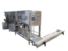 Load image into Gallery viewer, 300 bottle per hour 18.9 liter wash, fill, cap system. 304SS construction, CSA Certified. Shown with optional exit conveyor system. 