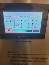 Load image into Gallery viewer, Touch screen control panel showing operation function screen on 300 bottle per hour 18.9 liter wash, fill, cap system. 304SS construction, CSA Certified.