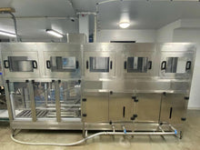 Load image into Gallery viewer, side view showing drain connection header on 300 bottle per hour 18.9 liter wash, fill, cap system. 304SS construction, CSA Certified.